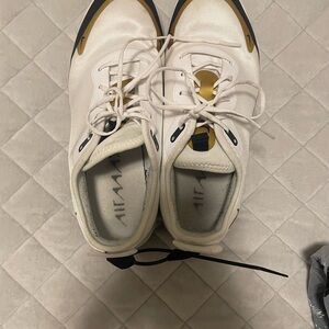 Nike White Sneakers with Gold Details